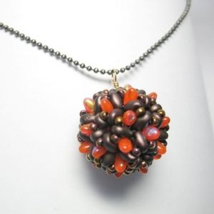Handwoven beaded bead pendant